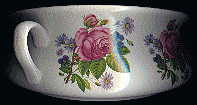side of chamber pot showing rose