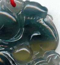 chinese jade pendant: back view of monkey