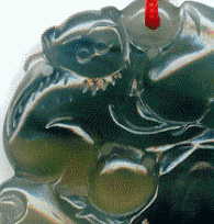 chinese jade pendant: front view of monkey
