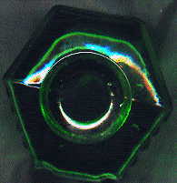 hexagonal green poison bottle: view of top