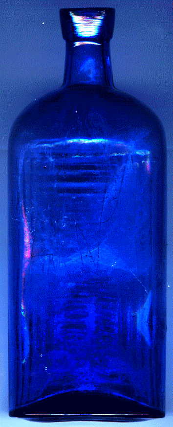 large blue victorian poison bottle: back view