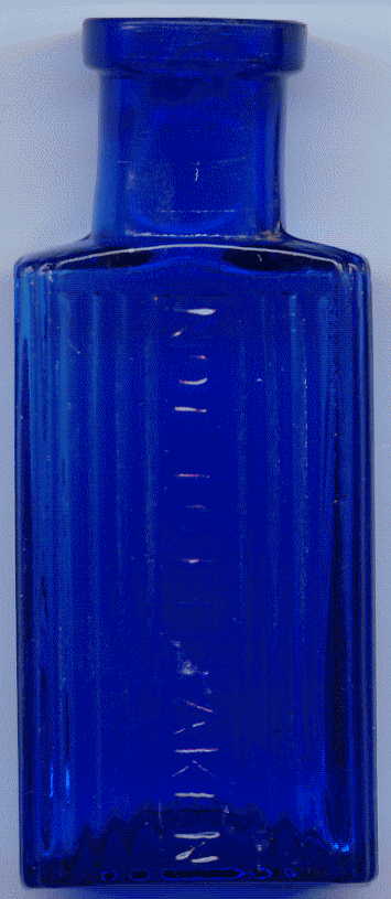 tiny bristol blue rectangular victorian ntbt poison bottle: front view