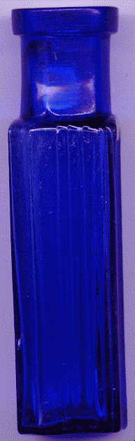 tiny rectangular bristol blue victorian ntbt poison bottle: left side