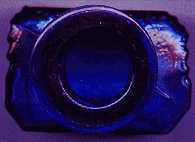 tiny bristol blue rectangular victorian ntbt poison bottle: top view