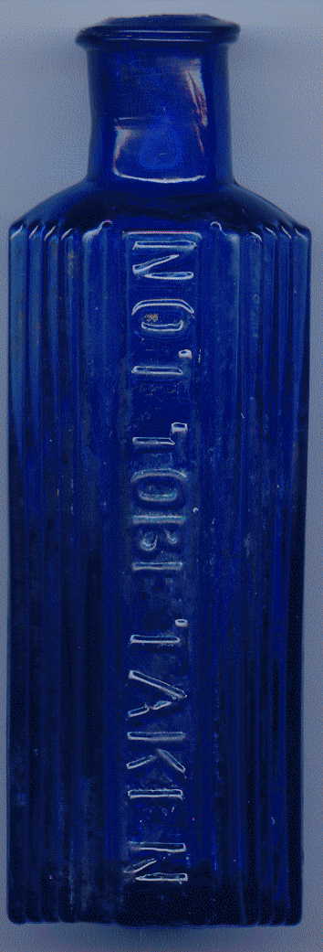 octagonal blue victorian poison bottle: front view. it says, NOT TO BE TAKEN